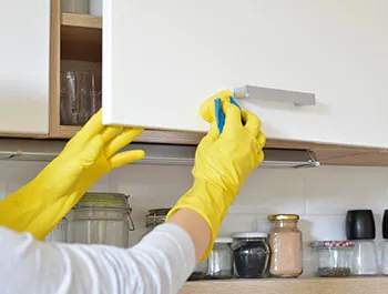What is the best way to clean and polish wood cabinets